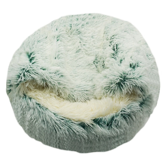 Fluffy green pet bed with white interior on a white background